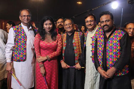 Members in festive Rajasthani waistcoats at a Dandiya Raas evening